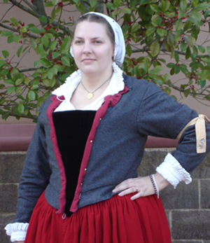 close-up of the doublet worn rolled and pinned back in place over bodies