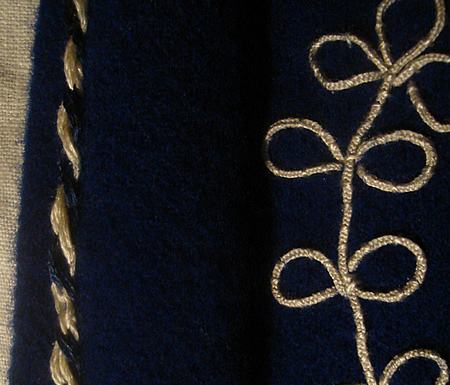 details of Miguel's cloak